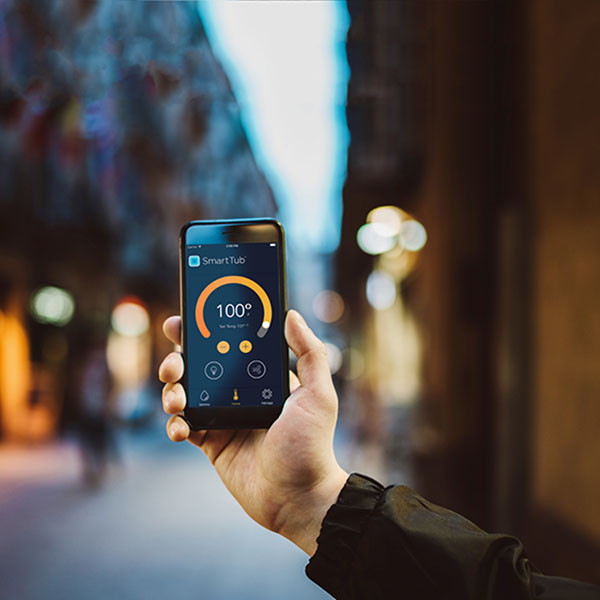 What is the Jacuzzi&reg; SmartTub&reg; system and will it help me save money on energy costs?